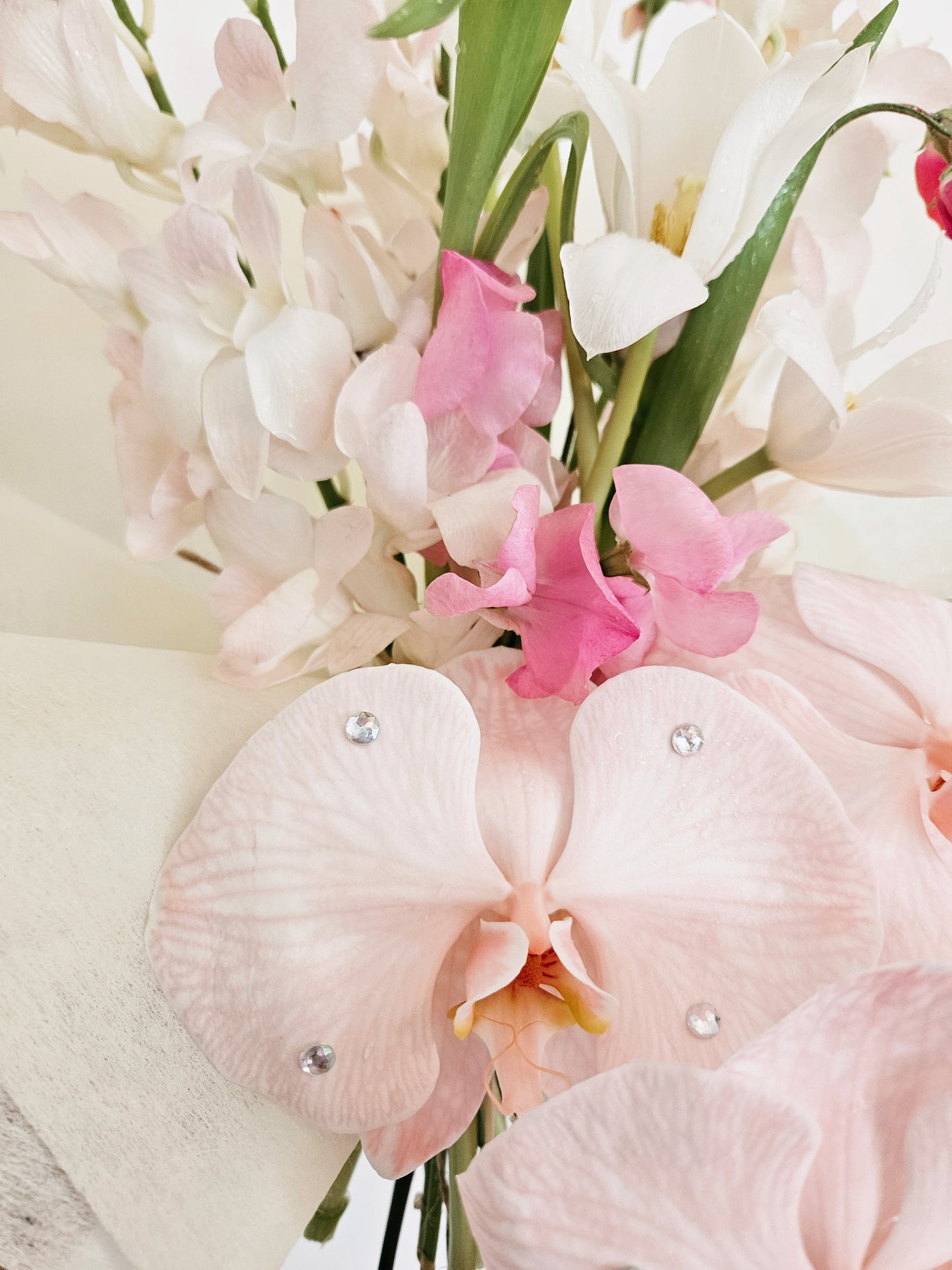 The Taylor - Vivid orchids and sweetpeas adorned with shimmering gemstones